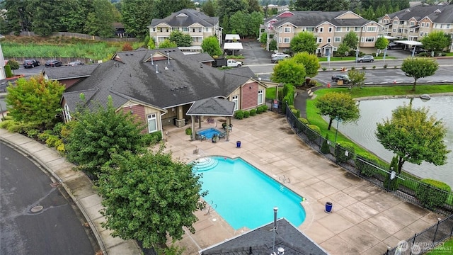 13426 97th Ave E Unit 204, Puyallup, WA 98373 - aerial perspective of suburban area featuring a pool