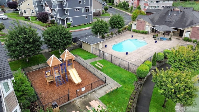 13426 97th Ave E Unit 204, Puyallup, WA 98373 - aerial view of residential area featuring a pool