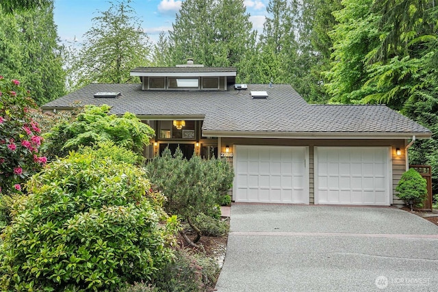 21016 NE 33rd Pl, Sammamish, WA 98074 - mid-century home featuring driveway, a garage, and roof with shingles