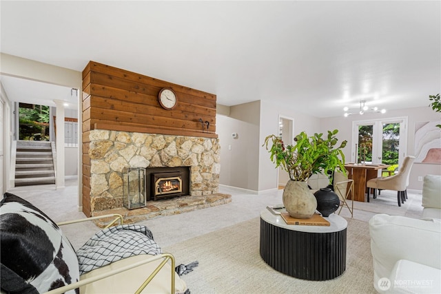 21016 NE 33rd Pl, Sammamish, WA 98074 - carpeted living room with stairs, baseboards, and a fireplace