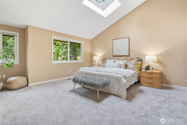 21016 NE 33rd Pl, Sammamish, WA 98074 - carpeted bedroom with a skylight, multiple windows, baseboards, and high vaulted ceiling