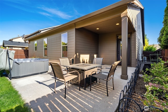 15325 NE 106th St, Vancouver, WA 98682 - view of patio / terrace featuring a hot tub and a fire pit