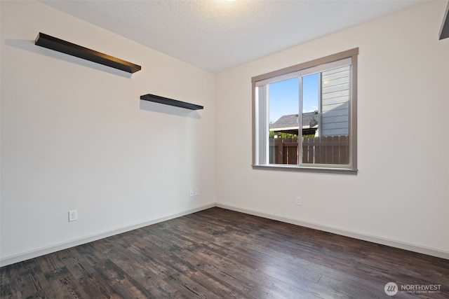 15325 NE 106th St, Vancouver, WA 98682 - spare room with dark wood-style floors and baseboards