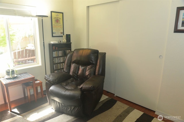 332 Rhododendron Dr, Sequim, WA 98382 - sitting room with wood finished floors and plenty of natural light