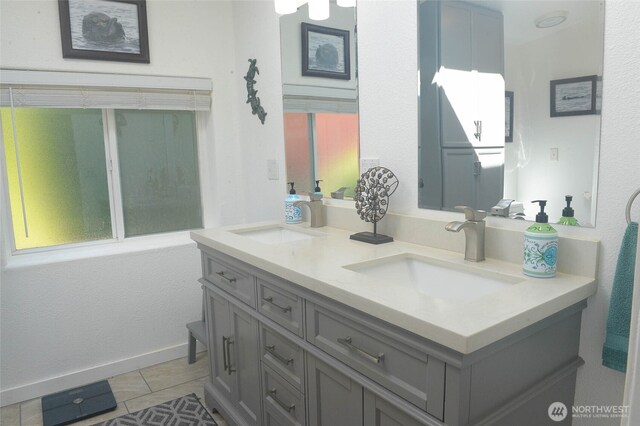 332 Rhododendron Dr, Sequim, WA 98382 - full bath with tile patterned floors and double vanity
