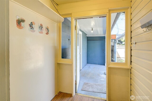 hallway with wood finished floors