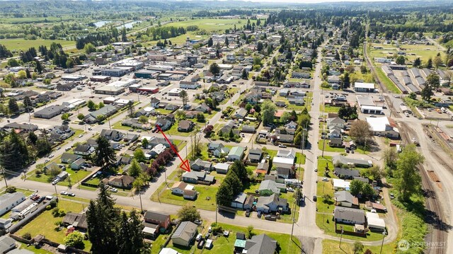 aerial view of property's location featuring nearby suburban area
