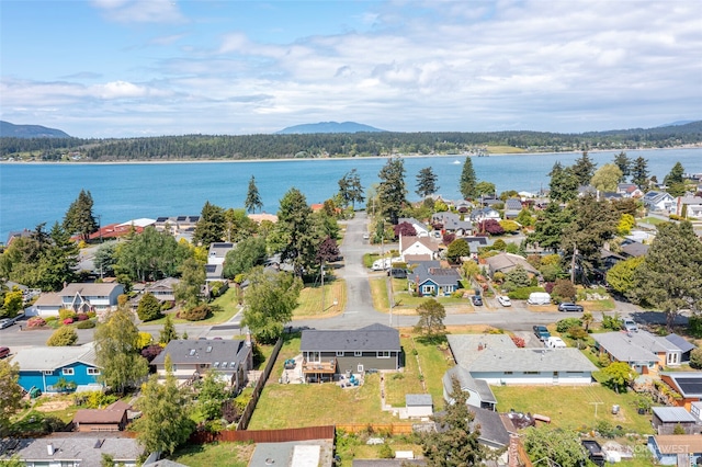aerial view of residential area with a water and mountain view