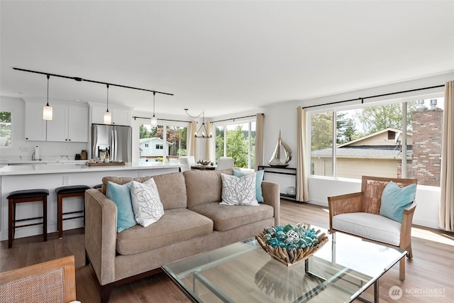 living area featuring light wood-style flooring