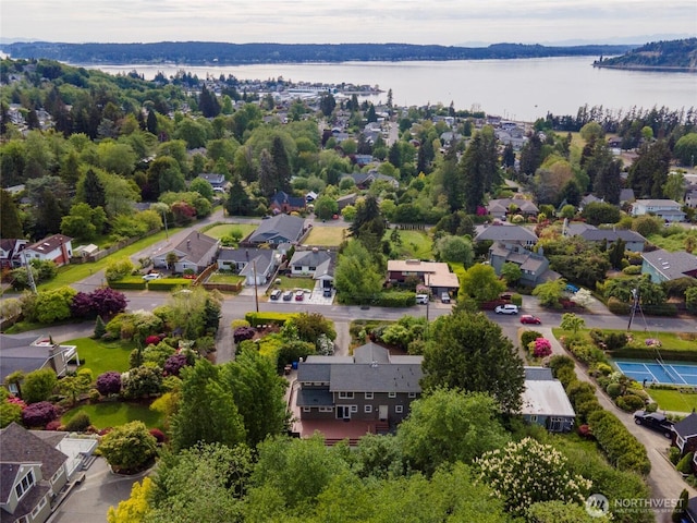 1533 S Sunset Dr, Tacoma, WA 98465 - aerial perspective of suburban area with a nearby body of water