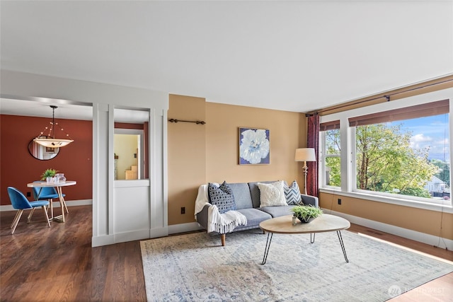 1533 S Sunset Dr, Tacoma, WA 98465 - living area with dark wood-style floors and baseboards