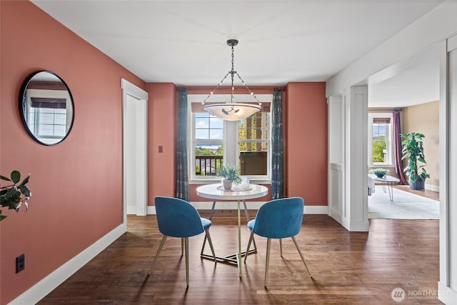 1533 S Sunset Dr, Tacoma, WA 98465 - dining area featuring baseboards and wood finished floors