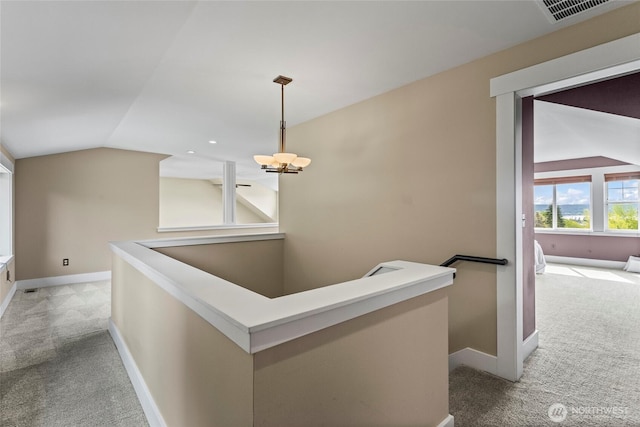 1533 S Sunset Dr, Tacoma, WA 98465 - hall with light carpet, an upstairs landing, lofted ceiling, and baseboards