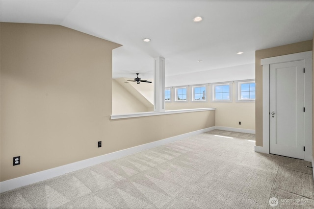 1533 S Sunset Dr, Tacoma, WA 98465 - additional living space featuring light colored carpet, a ceiling fan, baseboards, recessed lighting, and lofted ceiling