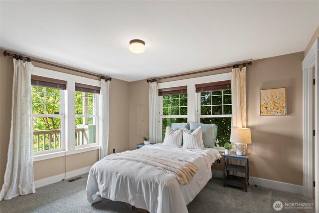 1533 S Sunset Dr, Tacoma, WA 98465 - carpeted bedroom with baseboards