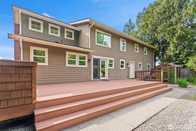 1533 S Sunset Dr, Tacoma, WA 98465 - rear view of house with a wooden deck