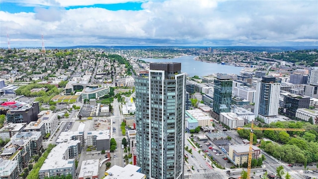 view of urban area with a large body of water