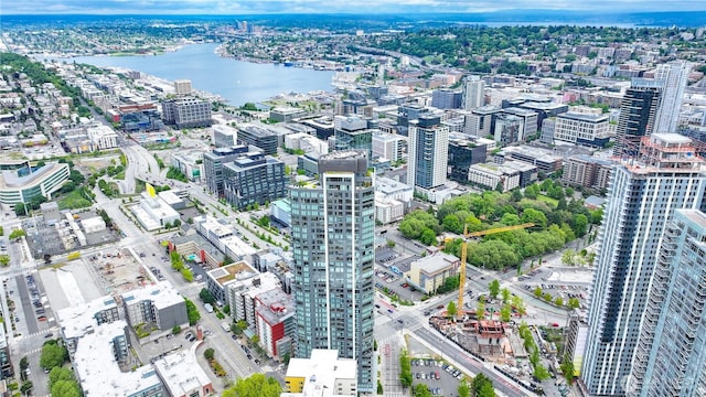 view of urban area featuring a nearby body of water