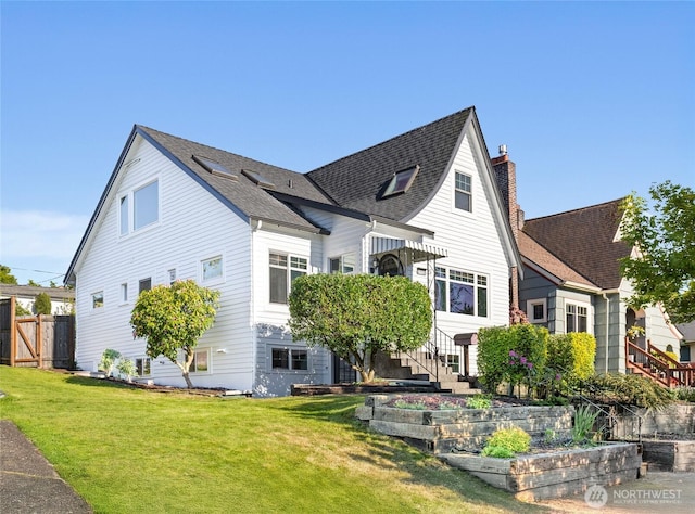 3112 13th Ave S, Seattle, WA 98144 - view of home's exterior featuring a chimney and roof with shingles