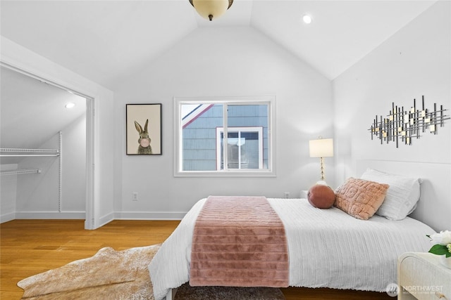 3112 13th Ave S, Seattle, WA 98144 - bedroom with lofted ceiling, wood finished floors, baseboards, and recessed lighting