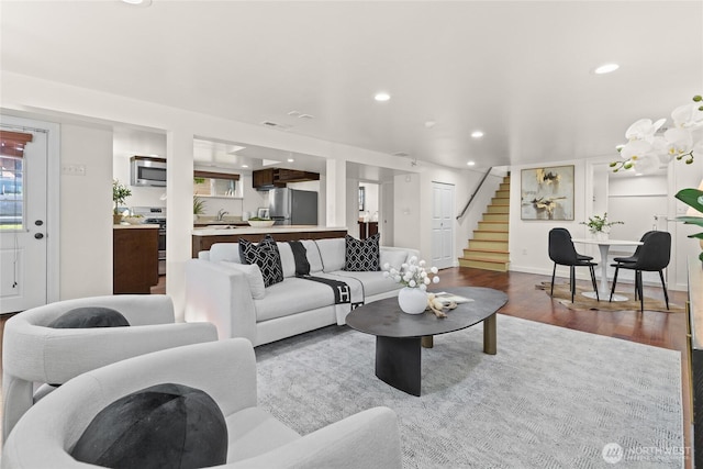 3112 13th Ave S, Seattle, WA 98144 - living area featuring stairway, recessed lighting, dark wood finished floors, and baseboards