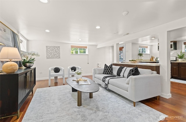 3112 13th Ave S, Seattle, WA 98144 - living area with recessed lighting, healthy amount of natural light, wood finished floors, and baseboards