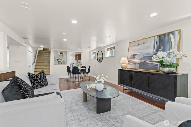 3112 13th Ave S, Seattle, WA 98144 - living room featuring wood finished floors, stairway, and recessed lighting