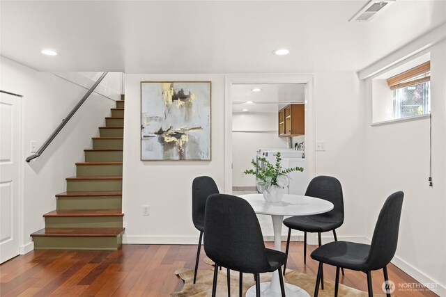 3112 13th Ave S, Seattle, WA 98144 - dining room with hardwood / wood-style floors, stairs, recessed lighting, and baseboards