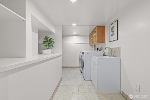 3112 13th Ave S, Seattle, WA 98144 - clothes washing area with washer and clothes dryer, cabinet space, recessed lighting, and baseboards