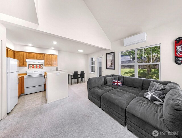 living area featuring a wall mounted AC, recessed lighting, high vaulted ceiling, and light carpet
