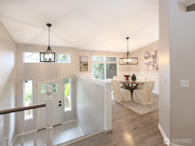 6723 50th Pl NE, Marysville, WA 98270 - foyer featuring a chandelier, wood finished floors, baseboards, and lofted ceiling
