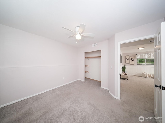 6723 50th Pl NE, Marysville, WA 98270 - unfurnished bedroom with carpet flooring, baseboards, a ceiling fan, and a closet