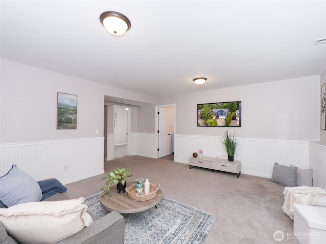 6723 50th Pl NE, Marysville, WA 98270 - living room featuring wainscoting and carpet
