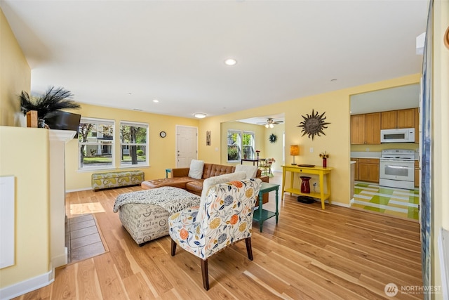 2758 Mcneil St, Dupont, WA 98327 - living area featuring light wood finished floors, baseboards, recessed lighting, and ceiling fan