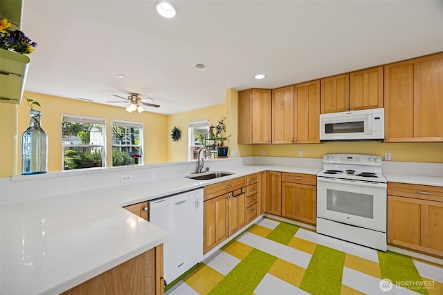 2758 Mcneil St, Dupont, WA 98327 - kitchen featuring white appliances, a sink, light countertops, and recessed lighting