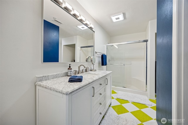 2758 Mcneil St, Dupont, WA 98327 - full bath with tile patterned floors, a stall shower, and vanity