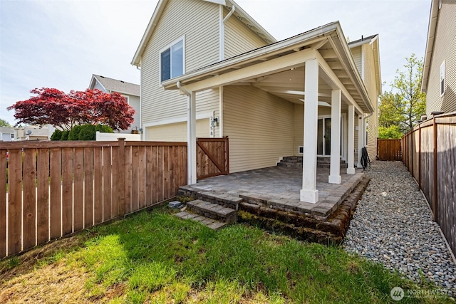2758 Mcneil St, Dupont, WA 98327 - back of house featuring a patio and a fenced backyard
