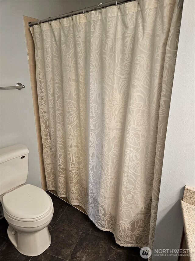 full bath featuring toilet