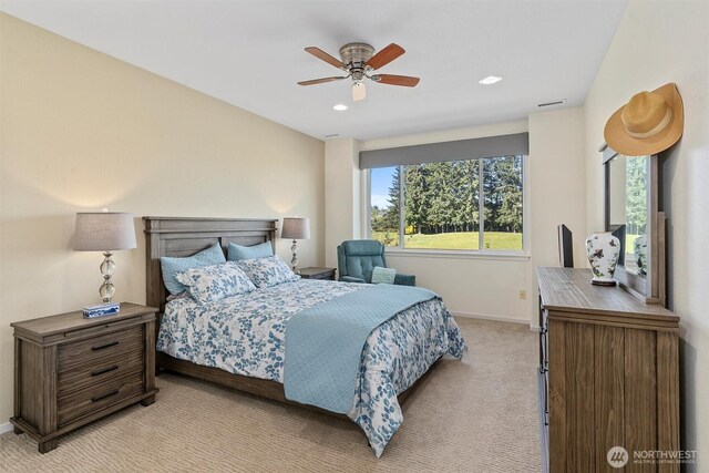 bedroom with light carpet, baseboards, a ceiling fan, and recessed lighting