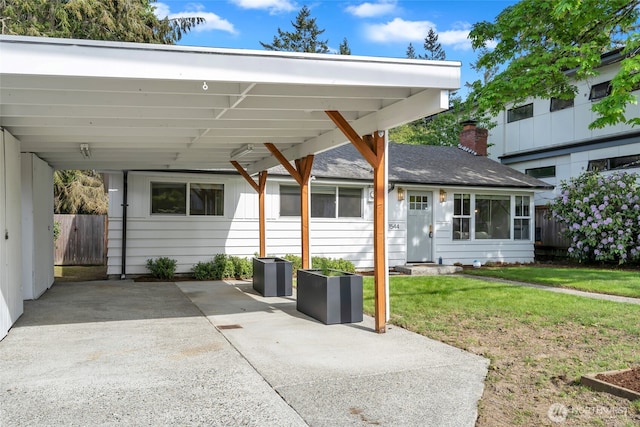 view of patio / terrace featuring a carport