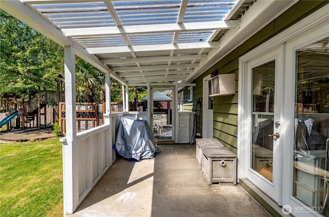 view of patio / terrace featuring a pergola and fence