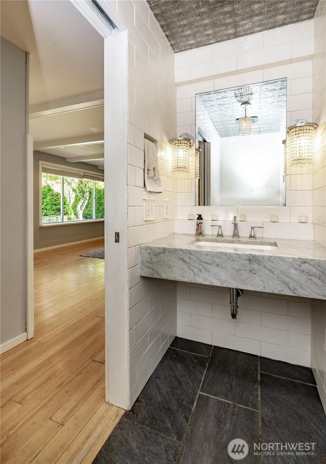 bathroom featuring wood finished floors and vanity