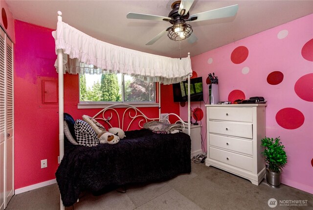 bedroom with carpet, baseboards, and a ceiling fan