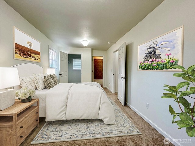 12504 S C St, Parkland, WA 98444 - bedroom with baseboards and light carpet