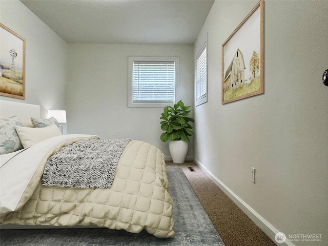 12504 S C St, Parkland, WA 98444 - bedroom featuring baseboards and carpet flooring