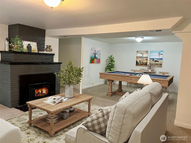 12504 S C St, Parkland, WA 98444 - living area featuring pool table, light carpet, and a large fireplace
