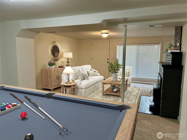 12504 S C St, Parkland, WA 98444 - playroom with carpet, billiards table, and a fireplace
