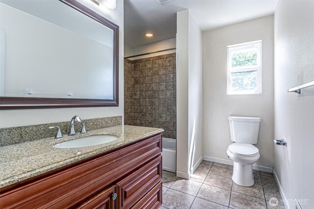 12504 S C St, Parkland, WA 98444 - full bathroom with vanity, tile patterned flooring, and tub / shower combination