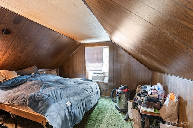 bedroom featuring wood walls, vaulted ceiling, carpet, and cooling unit