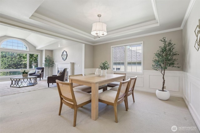 6222 139th Pl SE, Bellevue, WA 98006 - dining space featuring light carpet, a tray ceiling, wainscoting, and crown molding